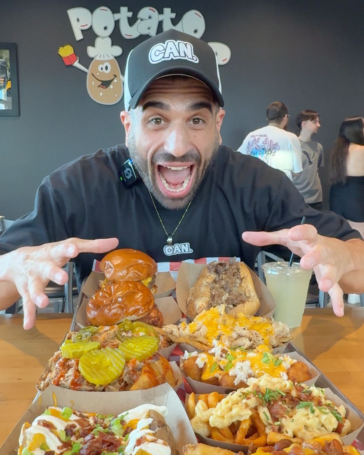 JWebby at Potato Coop with a full spread of the menu